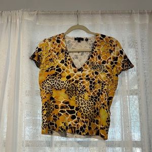 BcbgMaxazria leopard print blouse for women’s large size